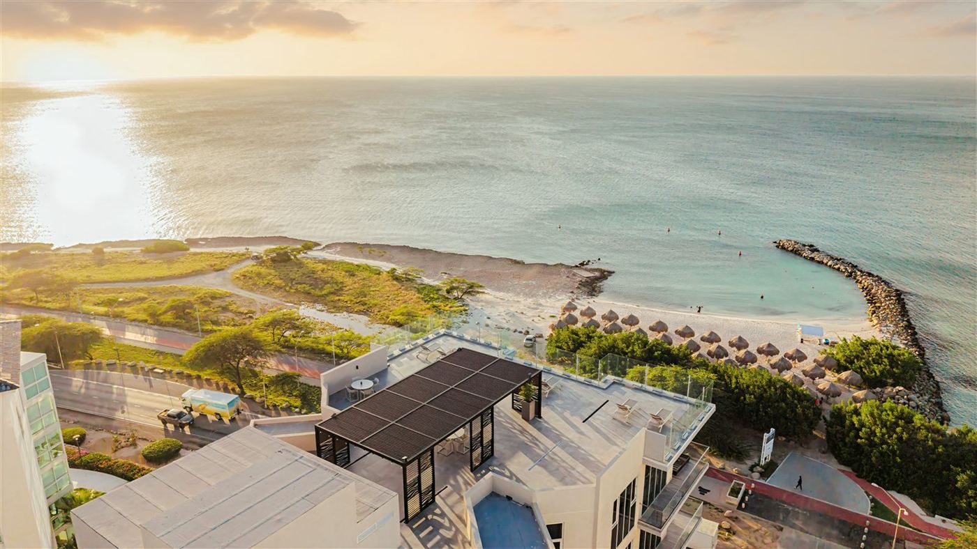 Reef Residence — Exterior — Aerial & Beach
